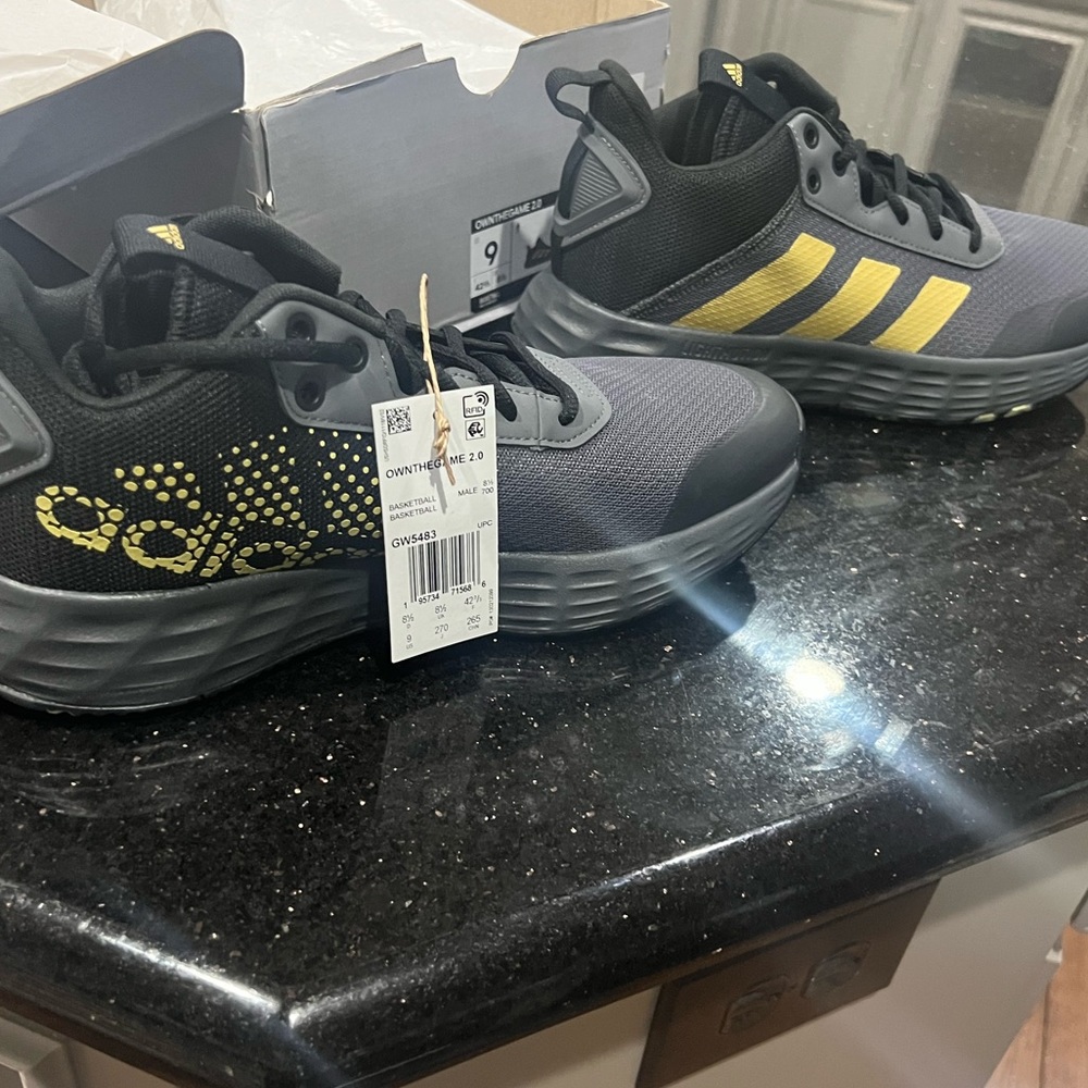 Men’s size 9 Own the game 2.0 basketball shoes